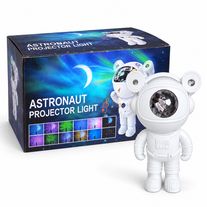 Baltas astronauto projektorius su originalia dėžute baltame fone