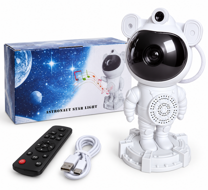 Astronauto projektorius su dėžute, pulteliu ir USB laidu baltame fone